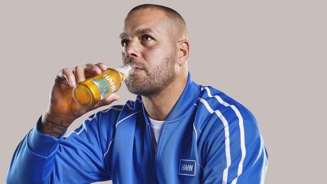 Off-brand? Buddy Franklin sips on a Hahn. Picture: Supplied