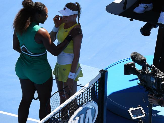 Serena Williams consoles her tearful opponent Dayana Yastremska after their match.