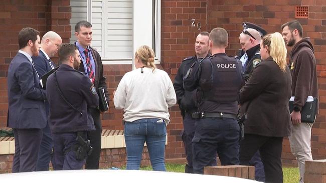 Police gather on Lilli Pilli Avenue in Beverley Park after the arrest of a prison escapee nearby. Photo: TNV