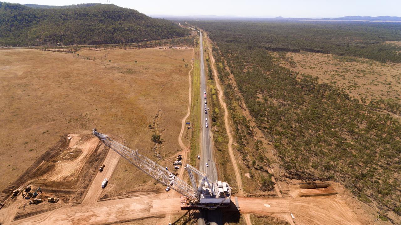 BHP dragline move to South Walker Creek. The dragline crossed the Peak Downs Highway about 8.5km west of the town of Coppabella. Coal