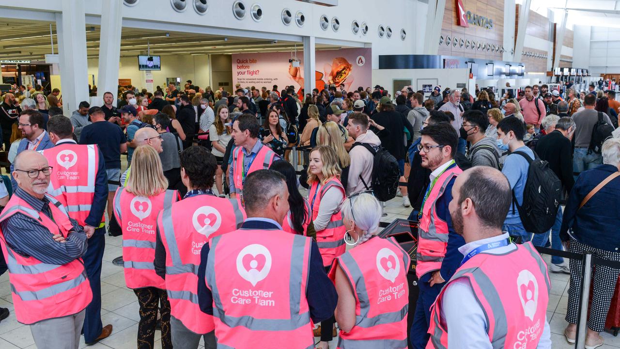 Customer care teams gather around the terminal. Picture: Brenton Edwards