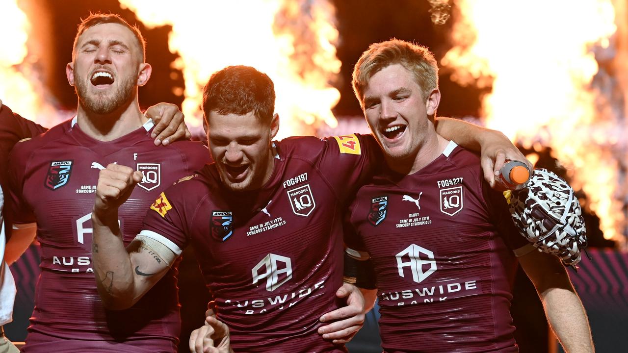 Maroons celebrate their epic series win. Picture: Bradley Kanaris/Getty