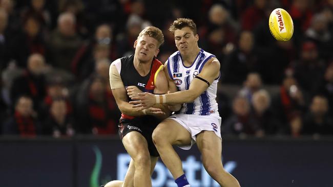 Kangaroo Cameron Zurhaar’s bone-crunching hit on Bomber Michael Hurley was a memorable moment in last year’s Round 17 clash between Essendon and North Melbourne. Picture: Dylan Burns/AFL Photos via Getty Images