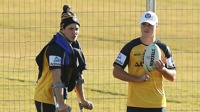 Injured Mitchell Moses with Jai Field during a Parramatta Eels NRL training vision opportunity at Kellyville Park, Sydney. Picture: Brett Costello