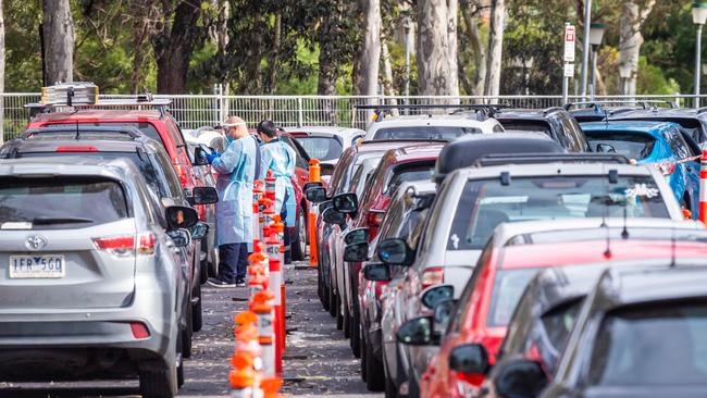 Cars in line at the LaTrobe testing site. Picture: Jake Nowakowski