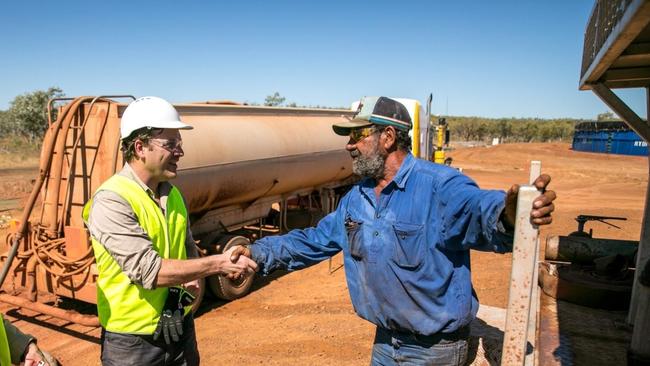 Empire Energy’s managing director Alex Underwood meets with Northern Territory contractors at the company’s Carpentaria well pad. Credit: File.