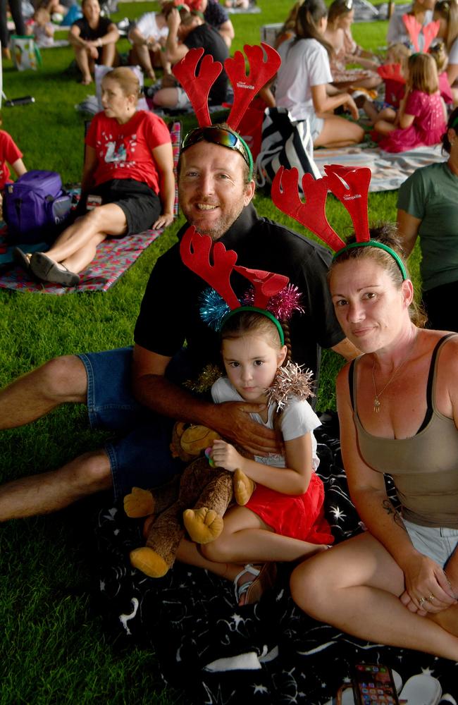 Carols by Candlelight at Riverway 2022. Michael Graham and Michelle Prins with Mia Graham, 5. Picture: Evan Morgan