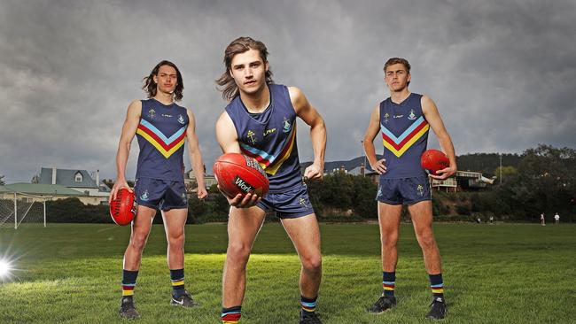 Guilford Young College football players LR Sam Collins, 18, captain, Oliver Davis, 18 and Sam Banks, 17 are ready for their state final on Saturday against St Patrick's College. Picture: Zak Simmonds