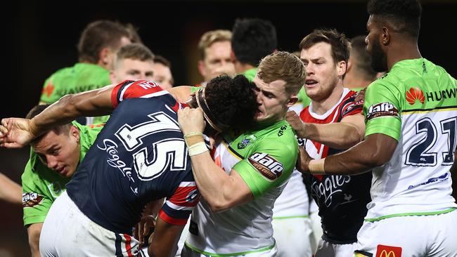 Players scuffle during the match. Picture: Cameron Spencer/Getty Images