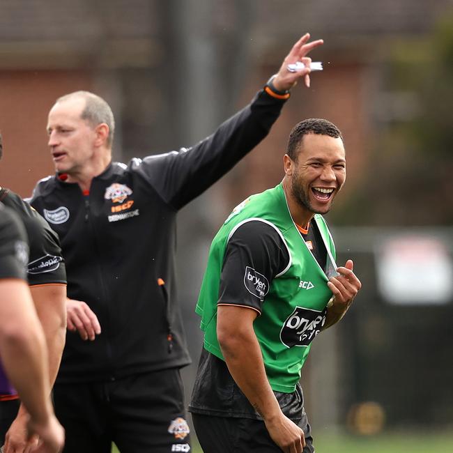 Moses Mbye and Tigers coach Michael Maguire. Picture. Phil Hillyard