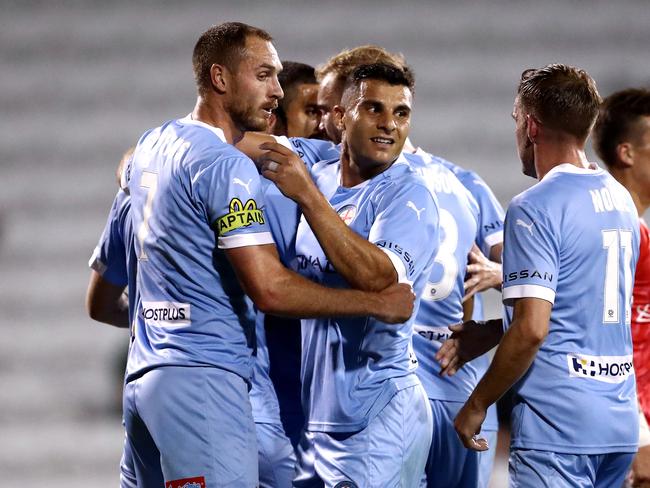 WOLLONGONG, AUSTRALIA - APRIL 05: Curtis Good of Melbourne City celebrates scoring a goal with team mates during the A-League match between Wellington Phoenix and Melbourne City at WIN Stadium, on April 05, 2021, in Wollongong, Australia. (Photo by Brendon Thorne/Getty Images)