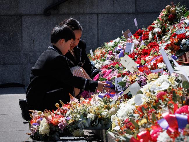 Children lay a wreath at the Shrine of Remembrance Picture: NewsWire