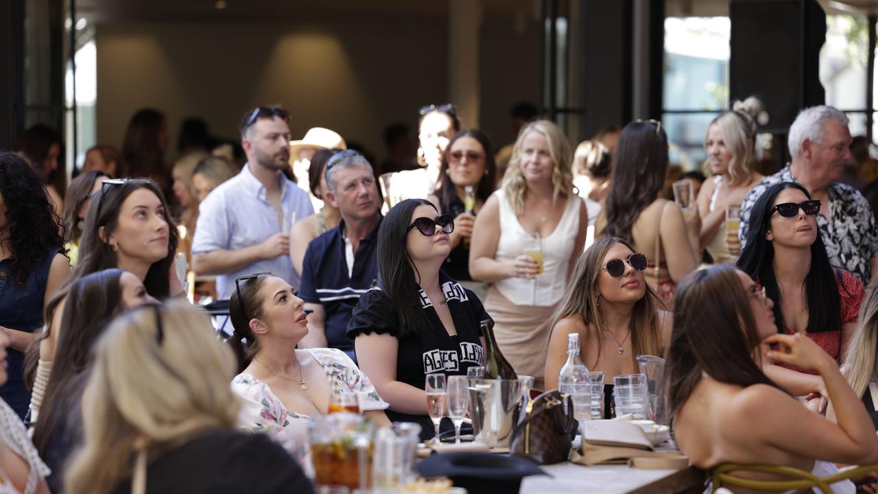 Adelaide footy fans soak up the 2023 Grand Final action. Picture: Emma Brasier