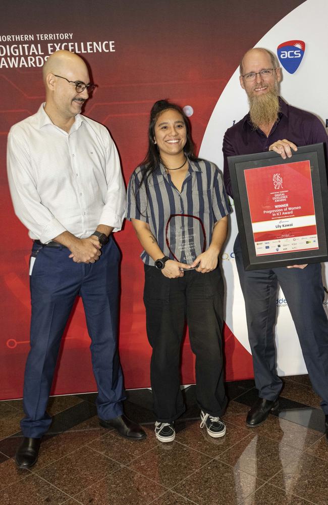 Bruno Braga, from the Department of Corporate and Digital Services with Digital Futures Inspiring Women winner Lily Kawai and Damien Charles, chair of the Digital Excellence Awards.