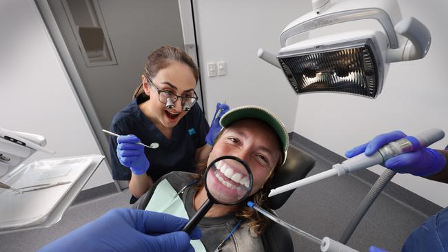 Health fund Bupa is to provide gap free dental care. Pictured are patient Tysyn Hall and Bupa Dental Dentist Dr Kiana Kianoush. Pic Alex Coppel.