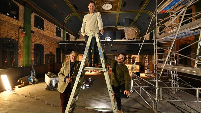 Dave Sleswick (right) with venue co-owners Steve Wilson (left) and Steve Sleswick (centre) ahead of the opening of the renovated Princess Theatre in Woolloongabba, Brisbane. Picture: Lyndon Mechielsen