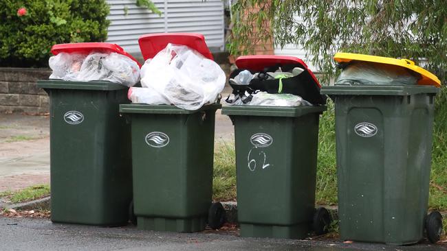 A new state government strategy will mean food waste will no longer go into red bins. Picture: John Grainger