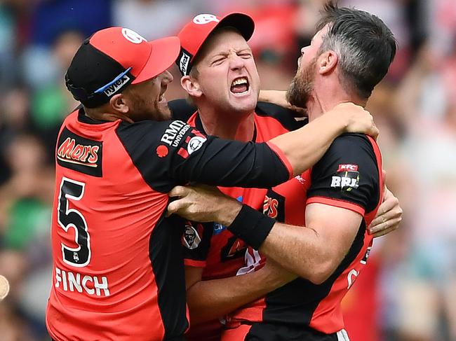 Aaron Finch, Cameron White and Dan Christian of the 2019-19 Melbourne Renegades celebrate winning a Big Bash League final over the Stars at Marvel Stadium. Picture: Quinn Rooney/Getty Images