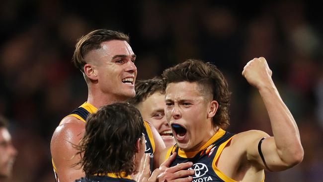 Jake Soligo celebrates his first goal. Picture: Sarah Reed/AFL Photos via Getty Images