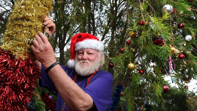 Homeless man Ray Johnson decorated trees outside Mosman Bay wharf with Christmas decorations three years ago.