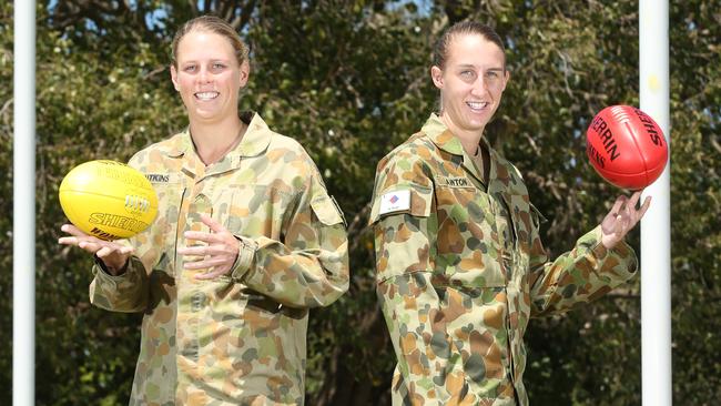 Kate Lutkins and Clare Lawton have been recruited by the AFL and are also members of the defence force. Pic Jono Searle.