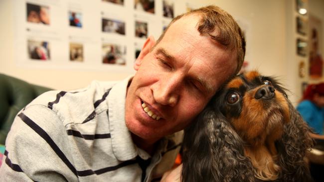 DoSomething Day 2017. Therapy Dog "Darci" and participant in the Chat and Pat program Matthew Scully. The Nepean Therapy dogs are running a Chat and Pat Program, offering seniors and people with disabilities a chance to interact with their dogs in small groups. (AAP Image/Justin Sanson)