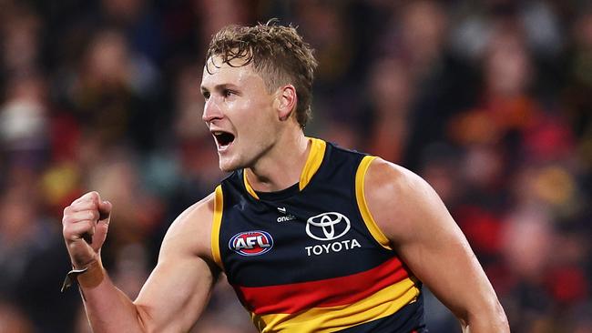 ADELAIDE, AUSTRALIA - APRIL 19: Jordan Dawson of the Crows celebrates a goal during the 2024 AFL Round 06 match between the Adelaide Crows and the Essendon Bombers at Adelaide Oval on April 19, 2024 in Adelaide, Australia. (Photo by James Elsby/AFL Photos via Getty Images)