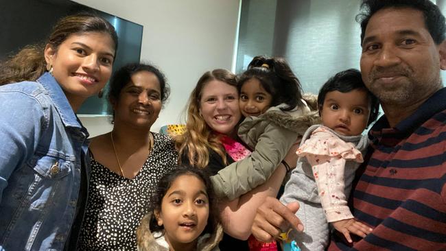 The reunited Biloela family — Priya, Nades, Kopika and Tharni Murugappan — pictured at Perth Children's Hospital on Thursday with family friends who have flown in from Biloela: Angela Fredericks (centre) and Vashini Jayakumar, left, and Vashini's child. Picture: Supplied