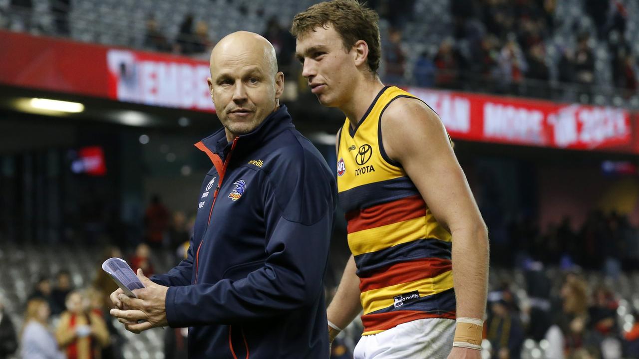 MELBOURNE, AUSTRALIA - JULY 09: Adelaide Crows senior coach Matthew Nicks and Riley Thilthorpe walk from the ground after the round 17 AFL match between Essendon Bombers and Adelaide Crows at Marvel Stadium on July 09, 2021 in Melbourne, Australia. (Photo by Darrian Traynor/Getty Images)