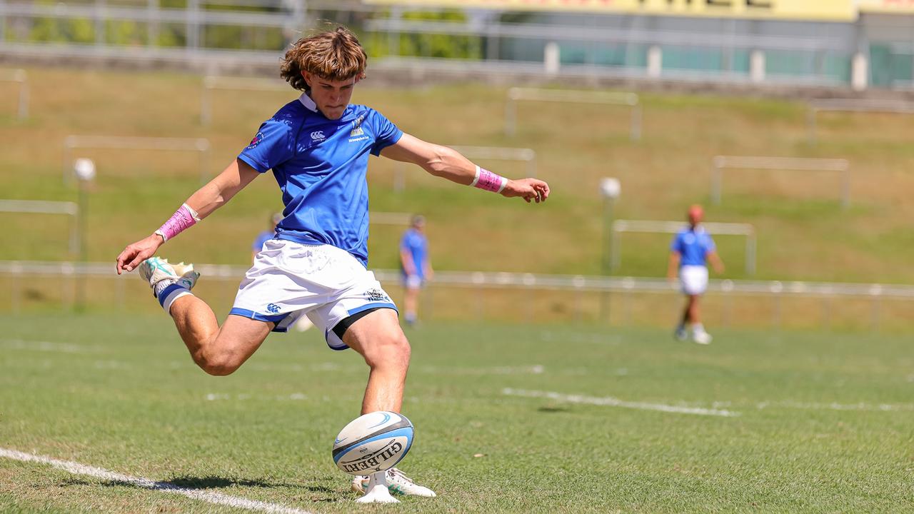 Zac Zeremes sends it over from the sideline. Buildcorp Emerging Reds Cup action from the day one match between Queensland Country Under-14s and Brisbane Junior Rugby Union Under-14s. Picture credit: QRU Media/ Erick Lucero.