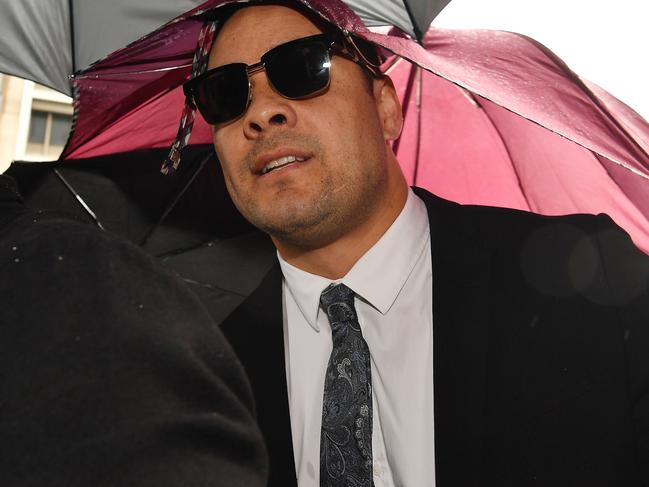 Jarryd Hayne was shielded by umbrellas as he walked into the court. Picture: Sam Mooy/Getty Images