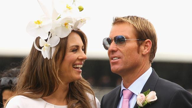 Shane Warne and Elizabeth Hurley at the Crown Oaks Day at Flemington Racecourse on November 3, 2011. Picture: Getty Images