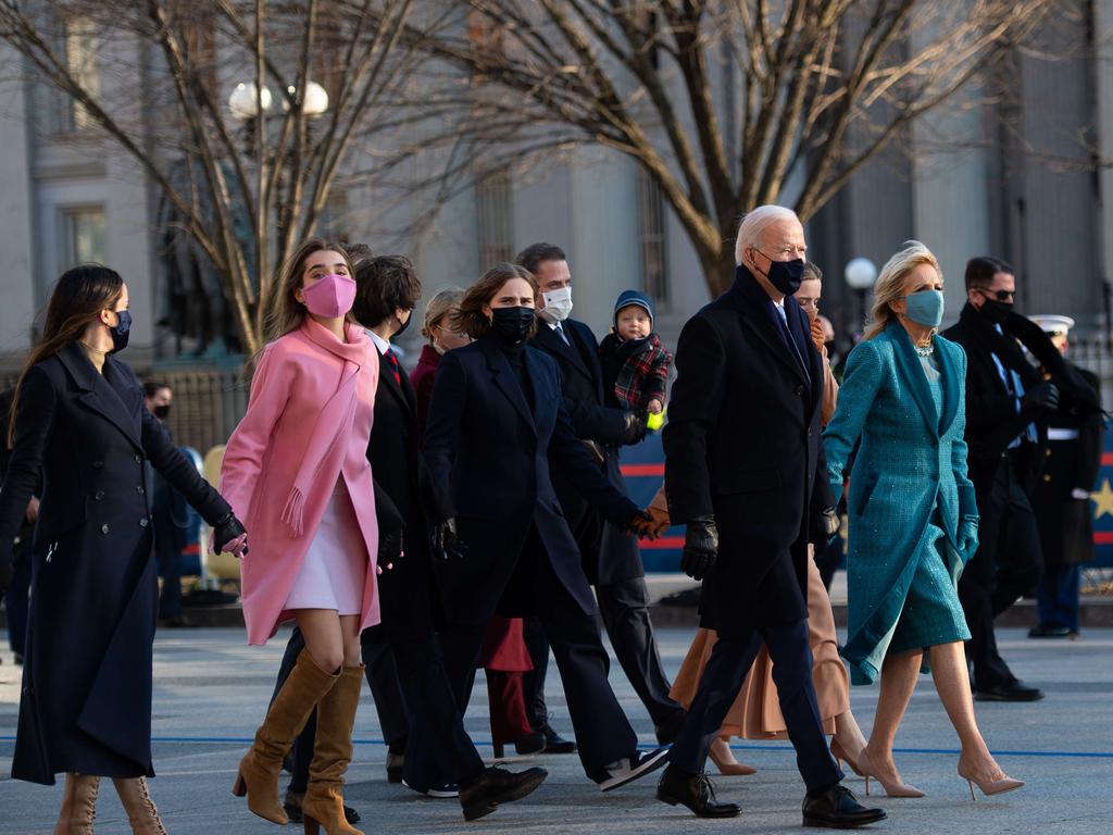 The Bidens and their close-knit family walk the abbreviated parade route after the inauguration. Picture: Mark Makela/Getty Images/AFP
