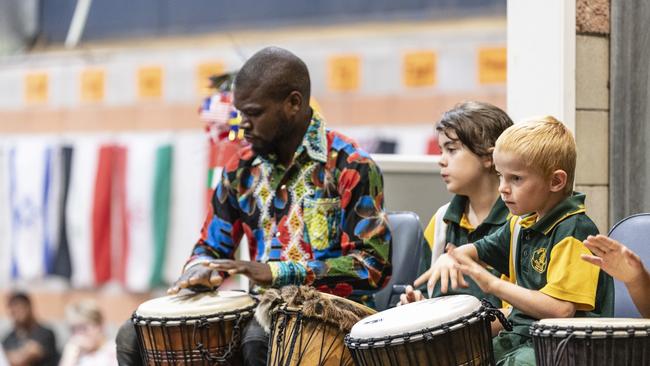 African drumming showcase participants, from left, Pasaka Mwibusa, Jessica Wyatt and Jayden Stevens during Harmony Day celebrations. Picture: Kevin Farmer