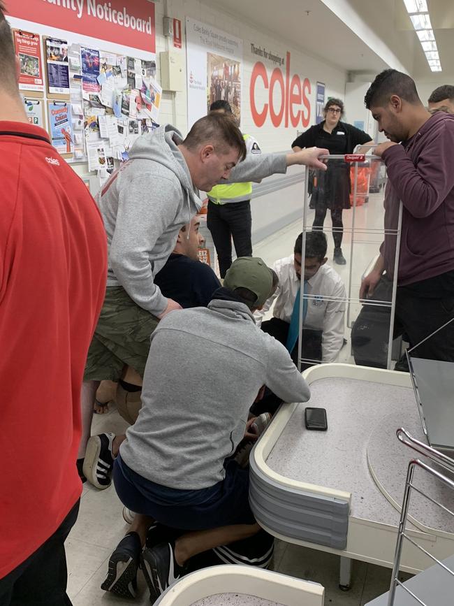 Several shoppers pinned down the man while they waited for police to arrive.