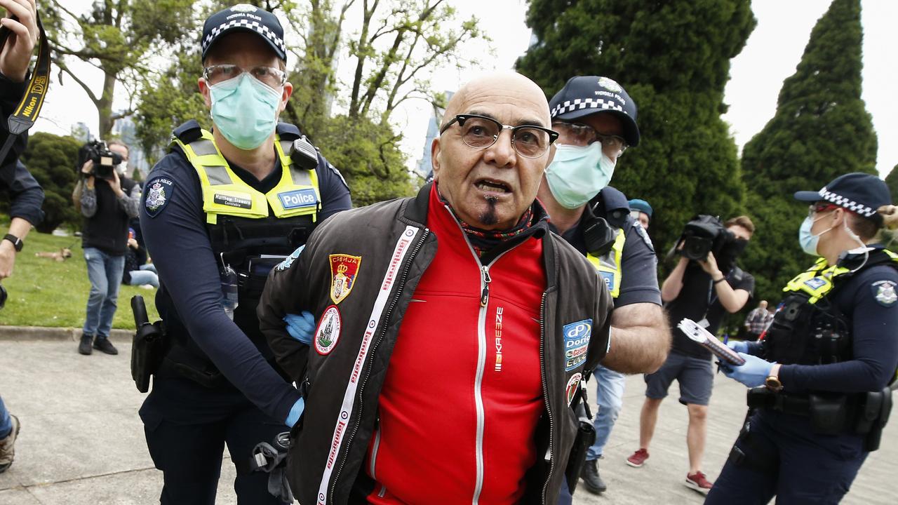 A man is taken away from the Shrine of Remembrance after calling police “tyrants”, “nothing but animals”, and “f**king idiots” as tensions rose shortly after 2pm on Friday. Picture: NCA NewsWire/Daniel Pockett