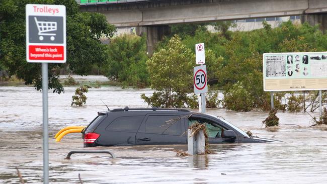 Flooding in the car park on the south side at Toombul Shopping Centre which is adjacent to an entrance of Airport Link. Locals says flooding has worsened since construction for the tunnel started in 2005. Picture: Peter Cronin