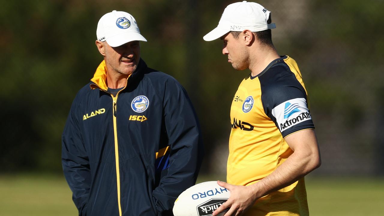 Eels coach Brad Arthur speaks with Mitchell Moses during a Parramatta Eels training session at Kellyville Park in Sydney.