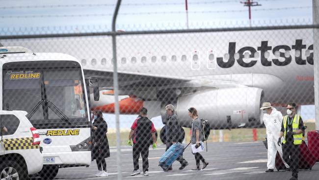 One of the last flights before travellers were forced to quarantine, JQ707, arriving at Hobart from Melbourne. Picture Chris Kidd