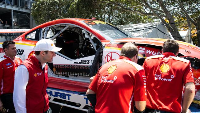 McLaughlin’s Mustang is towed away for repairs.