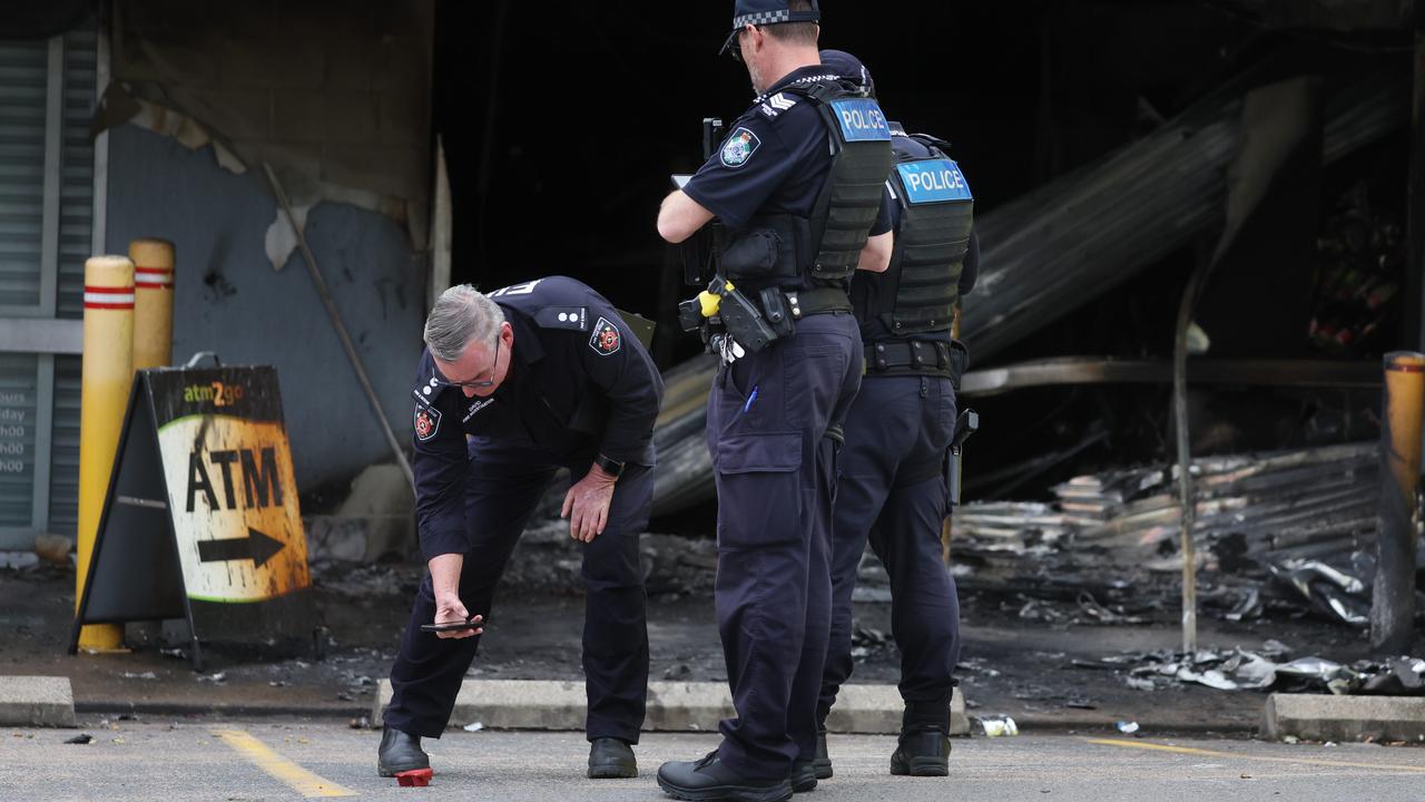 Police and fire officers at the scene on Friday morning. Picture: Annette Dew