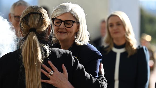 Anthony Albanese and Jodie Haydon greeted Sam Mostyn outside Parliament House before she was sworn in. Picture: NewsWire / Martin Ollman
