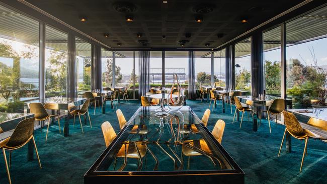 The Source’s classy dining room which is encased in a glass-walled pavilion set among the trees with glimpses of the River Derwent. Picture: Jesse Hunniford/MONA