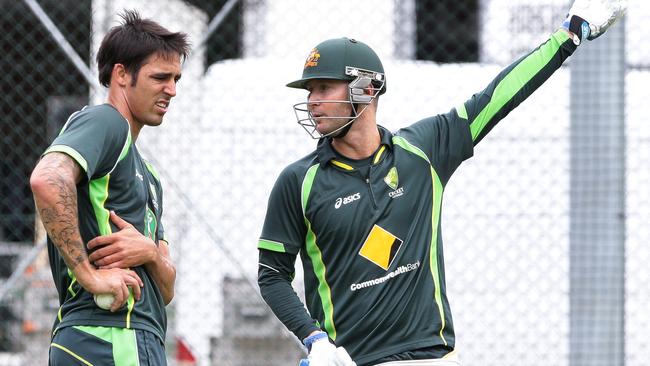 Mitchell Johnson and Michael Clarke. The Australian cricket team training at the Gabba in Brisbane. Pic Peter Wallis