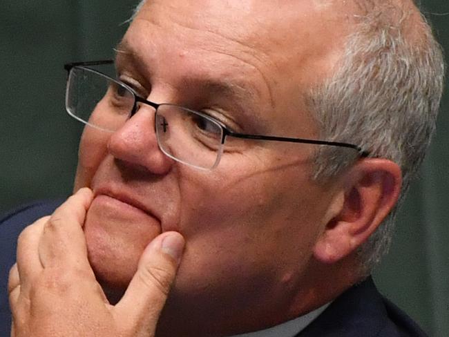 CANBERRA, AUSTRALIA - FEBRUARY 25: Prime Minister Scott Morrison during Question Time in the House of Representatives at Parliament House on February 25, 2021 in Canberra, Australia. Prime Minister Scott Morrison has lost a working majority in parliament after the Member for Hughes Craig KellyÃ¢â¬â¢s resigned yesterday and moved to the crossbench, warning he is prepared to vote against the government. Mr KellyÃ¢â¬â¢s decision to quit the Liberal Party came after the Prime Minister demanded he stop spreading misinformation about COVID-19 and take action against his office manager, Frank Zumbo, who faces allegations of inappropriate behaviour. (Photo by Sam Mooy/Getty Images)