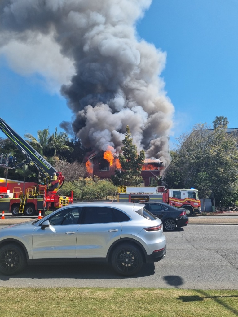 Smoke billows from the fire as nine crews battle to extinguish it. Picture: Jacki Drinnen