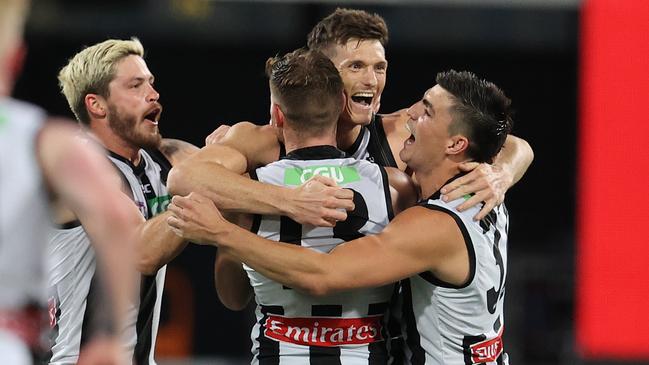 Brody Mihocek celebrates his goal in the fourth quarter for Collingwood. Picture: Michael Klein