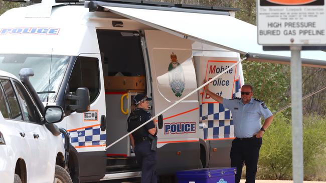 The road leading into Wains Road at Wieambilla is guarded by police on Tuesday. Picture: David Clark NCA/NewsWire