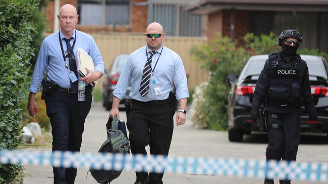 Victoria Police, the Australian Federal Police, the Australian Security Intelligence Organisation (ASIO), and other agencies which form part of the Joint Counter Terrorism Team at a property in Dallas, Vic. Picture: Alex Coppel.