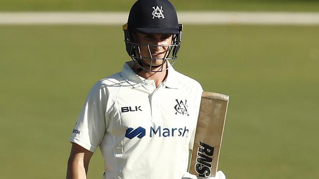 James Seymour raises the bat for his debut half-century. Picture: Darrian Traynor